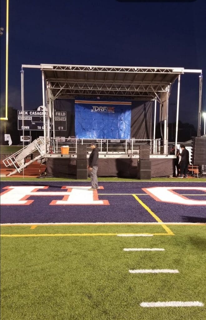Graduation Ceremony: SL100 Stage Setup in Football Field